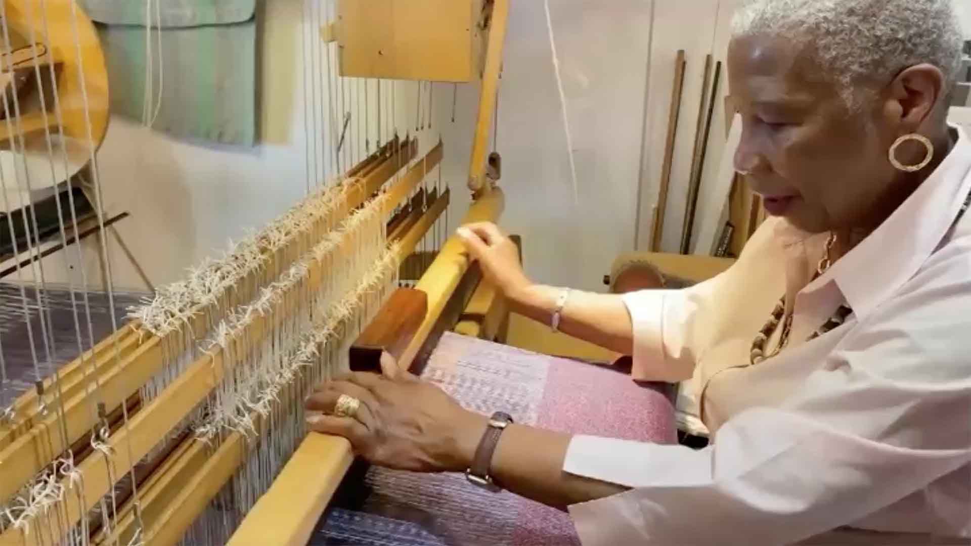 Doreen Gittens of Archipelago Textiles weaving at the loom