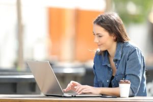 Attractive young woman using a laptop